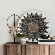 Decorative wooden necklace on an stand